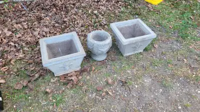for sale: 3 decorative concrete pots: the square ones are 13" x 13" while the round one is 8-1/2" in...