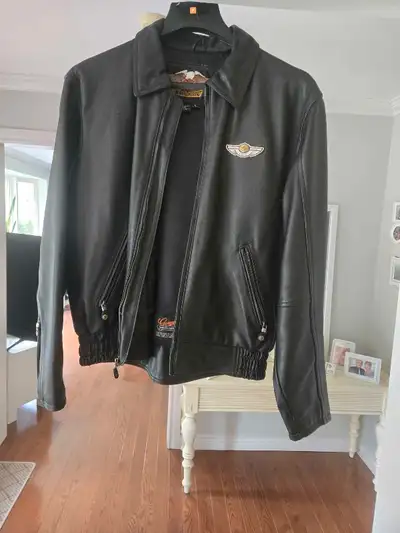 Genuine leather harley jacket. No rips or tears, very good condition. Men's size Large. Pickup in Co...