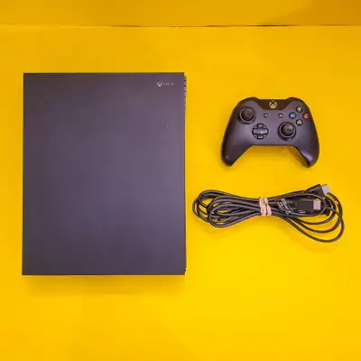 I'm selling this Xbox One X Console with Black Controller. If you want an extra controller it'll be...