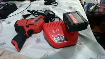 Milwaukee sawzall charger and battery, View more
