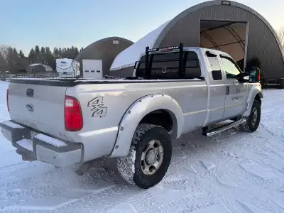 $8500.00 obo - 6.2 L well maintained, currently needs brakes and some body work. 316200 km No accide...