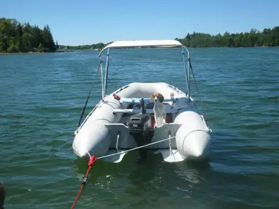Aquamarine GYL380 12.5’ i flatable boat with aluminium floor. Comes with Evinrude 20 hp Two carry ba...