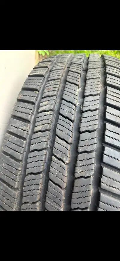 These Michelin Defender LTX tires in size 245/65R17 offer reliable performance and durability for yo...