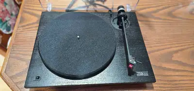 I'm selling a Music Hall MMF-2.1 turntable in good condition, perfect for vinyl enthusiasts looking...
