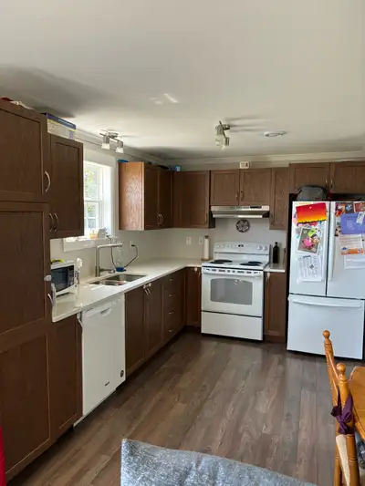 5 year old mini home for sale. To be moved by purchaser. 2 bed 2 bath, 896sq. Custom quarts countert...