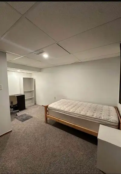 Private room in a clean, peaceful basement, ideal for a student or working person. * Wi-Fi, hydro, a...