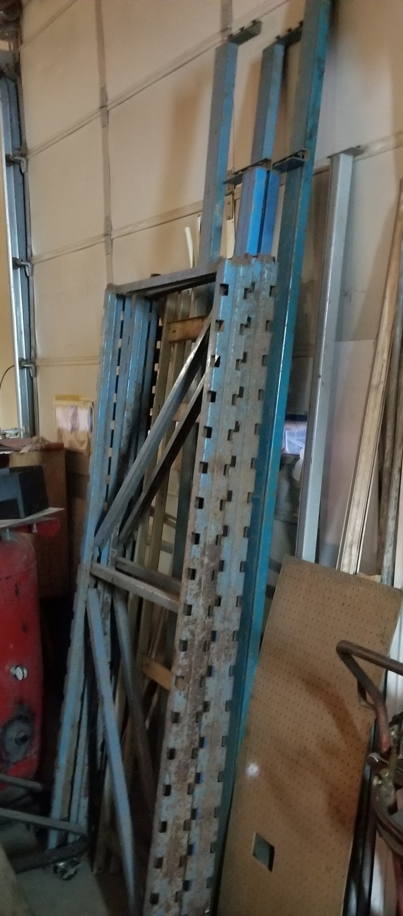 Industrial Steel racking with assorted lengths of cross pieces
