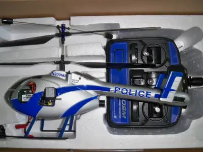 VINTAGE E-FLITE RC  4-CHANNEL POLICE HELICOPTER, View more