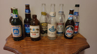 Vintage tall boy beer bottles.