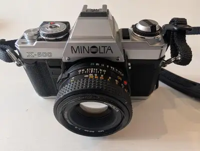 Vintage Minolta X-500 SLR camera and accessories, View more