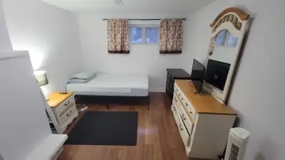 All inclusive basement apartment Shared kitchen Furnished Very clean Camera in common areas (kitchen...