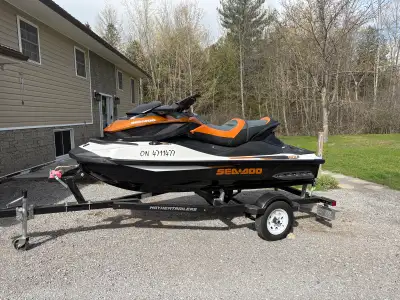 Just out of heated storage . Mint condition 135 hrs . Mature owner c/w 3 year old trailer with led l...