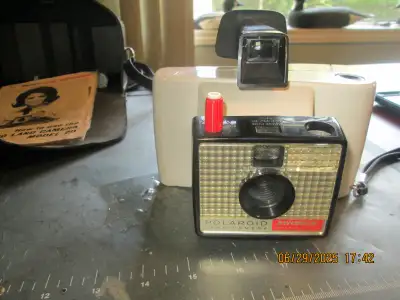 camera and case with book, nice condition, see my other items