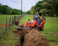 Kubota Tractor backhoe digging landscaping for hire