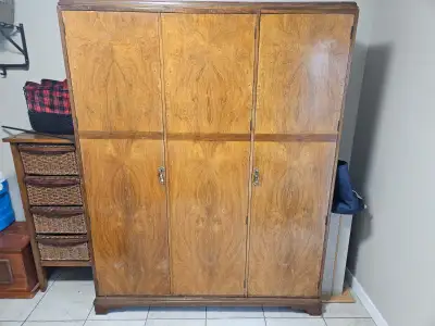 Solid 3/4" walnut Armoire with original finish. Four pieces (Base, Closet, Shelving Unit and Top Cap...