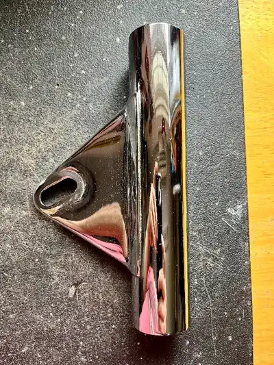 Chrome headlight brackets for Norton Commando. Chrome finish is pitted with some rust apparent. Brac...