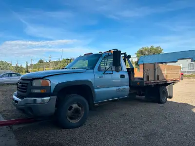 2003 GMC 3500 Flatdeck Dually (rwd) automatic transmission, v8 8.1L vortec gas engine. Just got bran...