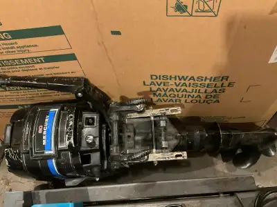 1971 20 hp long shaft Mercury outboard motor with cruise-a-day tank. Runs. Reason for selling - boug...