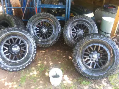 17 inch universal Wheels 8 lug with 33 inch tires There are 6 tires in total 4 will get u through a...