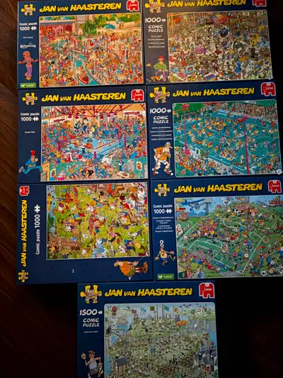 7 Jan Van Haasteran puzzles for sale. Six are 1000 piece and one is 1500. The 1000 piece are Fata Mo...