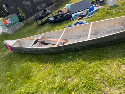 Aluminum 17ft canoe decent condition Comes with anchor and electric motor and boat safety container....