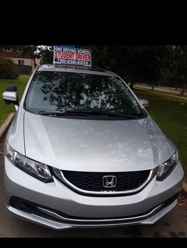 Female driving instructor- driving training534365255217326083