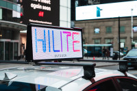 Earn Extra Money Without Driving More Hours with Hilite Ads!