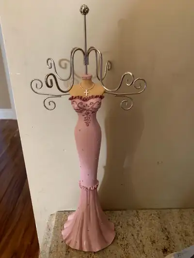 15” tall. 6 spots to hang jewelry. Body with dress is made of resin. In excellent condition. A coupl...