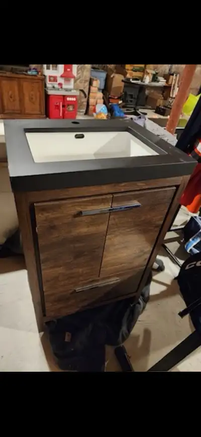 High quality vanity with soft close doors and acrylic sink. Never installed. Asking $900 OBO. $1364....