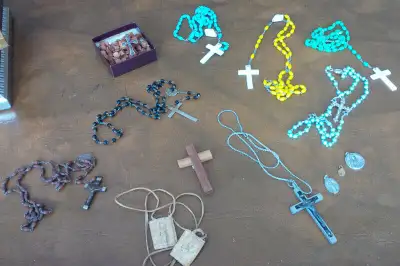 Scapula is sold. These 7 rosaries are made with an assortment of materials including plastic, wood,...