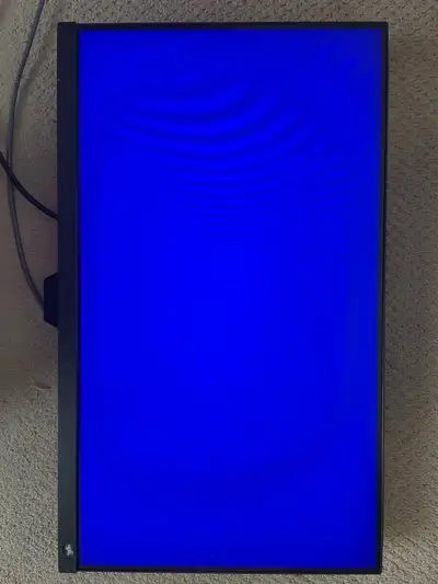 No dead pixels or flickering. Has a scratch near the top of the monitor on the bezel and slightly on...
