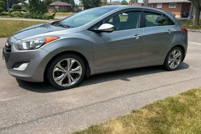 2013 Hyundai Elantra in fantastic shape! I absolutely love this car but I need something bigger, whi...