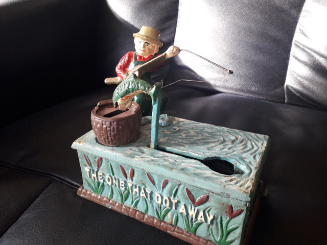 Cast Iron Fisherman Mechanical Coin Bank, "The One That Got Away in Arts & Collectibles in St. Catharines - Image 2