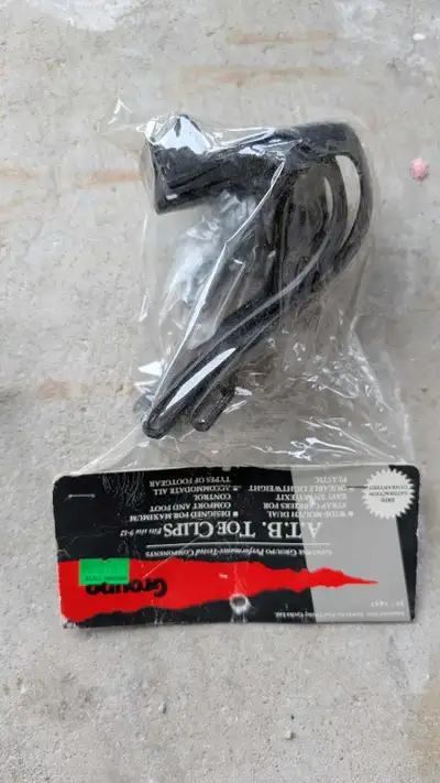Bike toe clips and bottle holder , View more