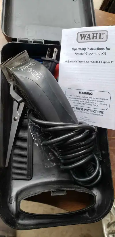 I'm selling a Wahl Animal Grooming Kit, which includes clippers designed for trimming animal coats....