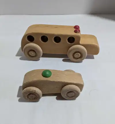 Wooden school bus and car made by The Toy Factory PEI, View more