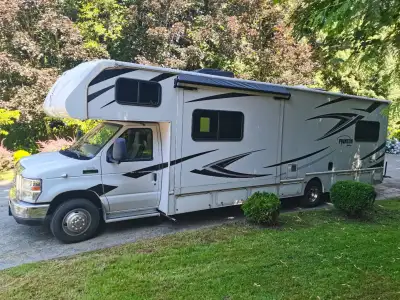 This is a 2019 Nexus Phantom Class C Montorhome with 3 Queen size beds and 2 single beds PLUS a KARK...