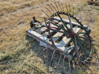Single wheel rake