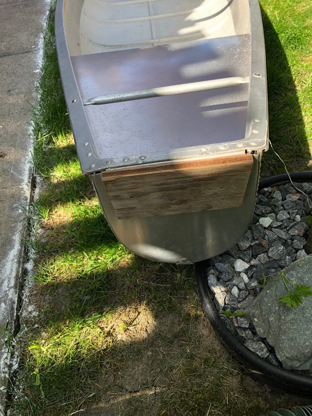 17 foot flat back aluminum Grumman Canoe and 3.5 hp Nissan Motor