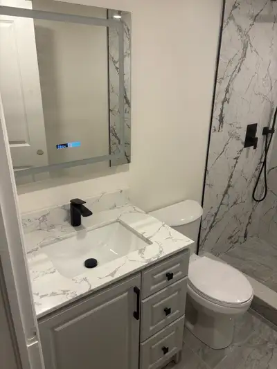 New and clean 2 bedroom, 1 bathroom unit with kitchen, living room, and storage area. Includes 2 par...