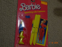 Barbie skiing outfit, 1989, mint pkg. skis,suit,boots , pink,yel