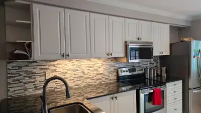 White Kitchen Cabinets with Granite Countertop – L-Shape + Bar P, View more