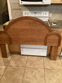 Free Queen oak headboard and frame come get tonight.