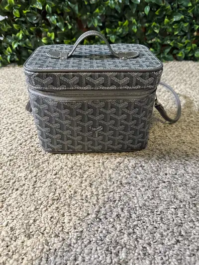 Check out this stylish Goyard makeup bag, perfect for keeping your cosmetics organized on the go! It...