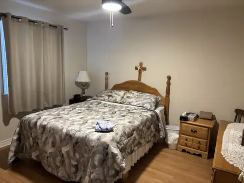 This cozy and well-maintained two-bedroom duplex offers a comfortable living space, featuring functi...