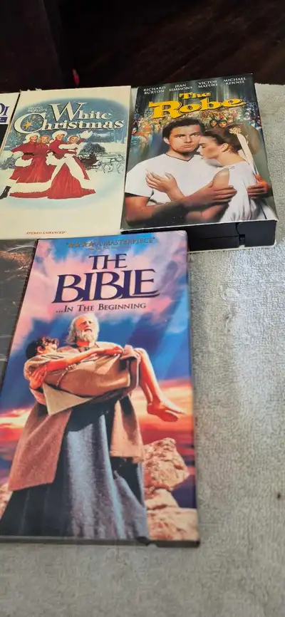 Selling a collection of VHS tapes, including classics like 'White Christmas', 'The Robe', 'The Bible...