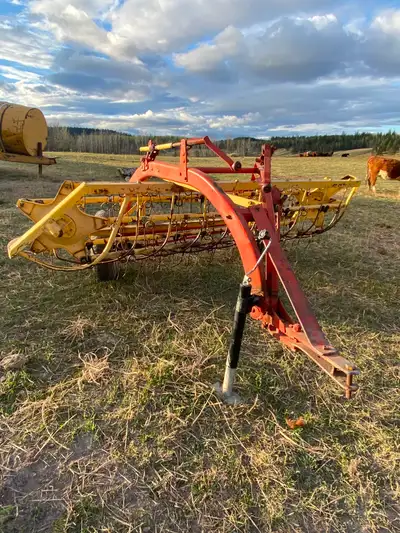 NH 56 basket style ground driven hay rake good condition fresh service all teeth in place field read...