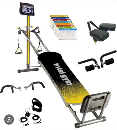 Get ready to revolutionize your fitness routine with this used Total Gym workout machine! This versa...