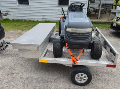 All aluminum Trailer Fits a 42" lawn tractor or a 4-wheeler Led Tail Lights Diamond plated tool box...