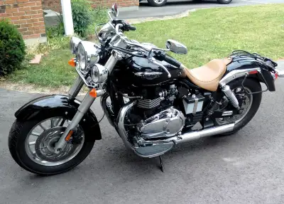 Bought in 2013 new. Has side slash pipes dealer installed. Has the original Triumph quick release wi...